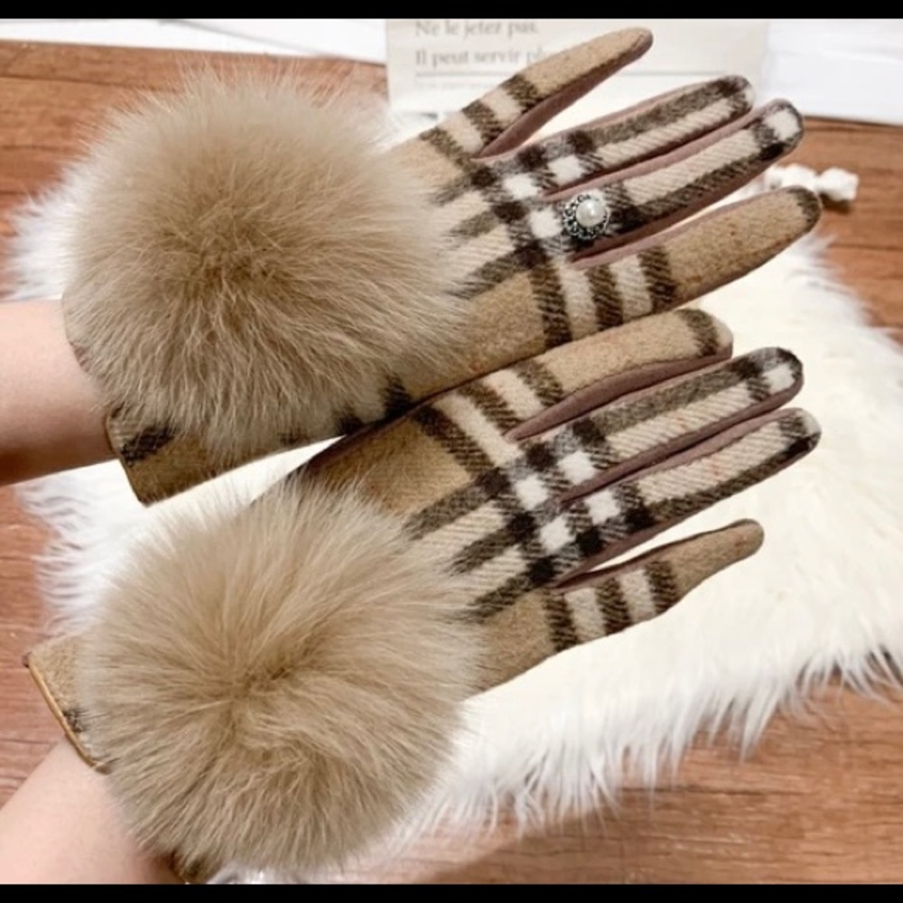 Tan and white plaid gloves with fox fur ball